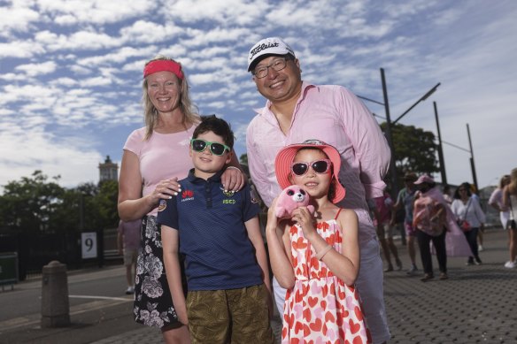 Katie and Sidney Lin, together with their children Donovan and Maddison, arrive at the SCG before the start of play on day four.