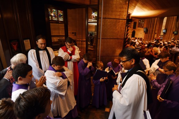 Kanishka Raffel (third from right)  at an Easter Sunday service before he became archbishop.