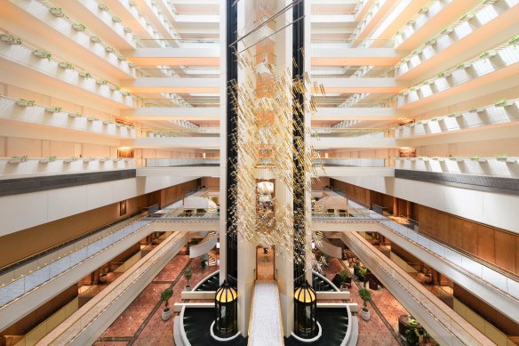 The soaring atrium of Conrad Singapore Orchard hotel.