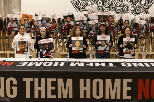  On Tuesday in Tel Aviv, released hostages (from left) Sharon Aloni Cunio, Lena Troufanov, Meirav Tal, Ilana Gritzewsky and Raz Ben Ami hold posters of their loved ones still held in the Gaza Strip.