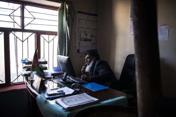 The Afghan Independent Human Rights Commission’s (AIHRC) Uruzgan office was opened by Haji Abdul Ahad Bahai, pictured working in his office, who is from Uruzgan and known locally as The Chancellor.