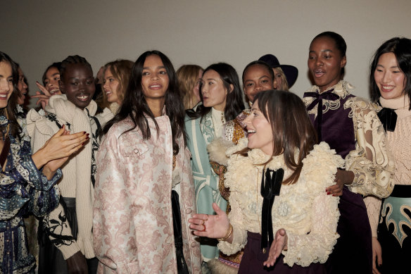 Nicky Zimmermann with models backstage at the Zimmermann presentation at New York Fashion Week.