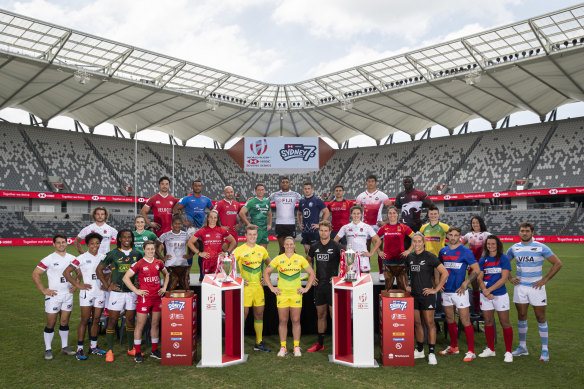 Captains from the men's and women's sides competing at the Sydney Sevens pose for a photo at Bankwest Stadium. 