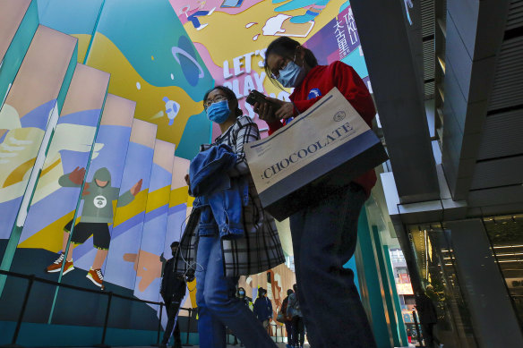 Shoppers in Beijing. There is optimism that a rebound in retail sales at the end of the quarter, in September, shows consumer confidence in high.