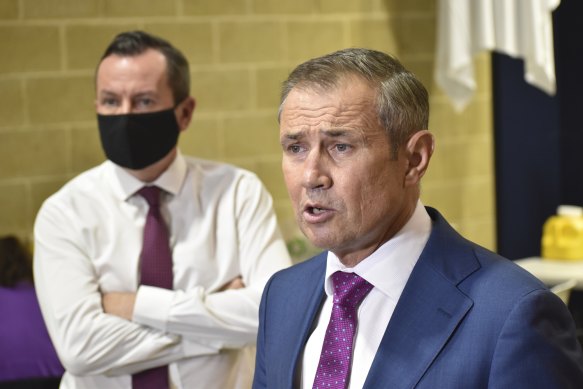 Health Minister Roger Cook and Premier Mark McGowan at a vaccination announcement on Wednesday.