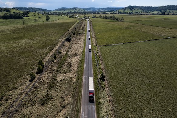 A convoy of RFS trucks arrives with supplies into Lismore after roads to the town finally begin to reopen.