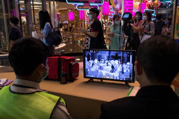 The temperatures of all shoppers entering the Siam Paragon mall in Thailand are being monitored in an attempt to curb the coronavirus’s spread.