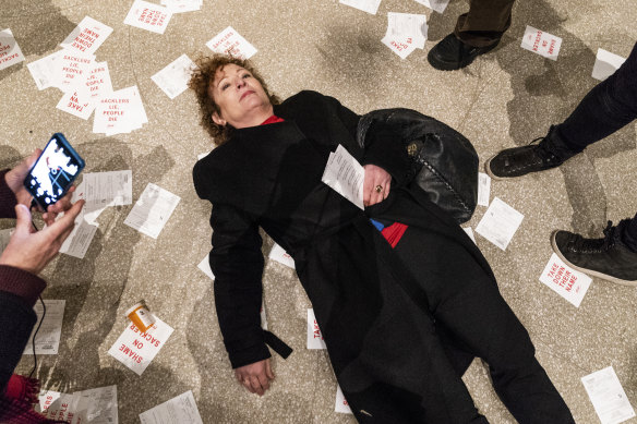 Goldin protesting in a ‘die-in’ the Guggenheim.