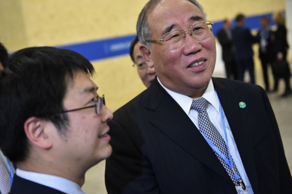 China’s Special Envoy on Climate Change Xie Zhenhua, right, in Paris.