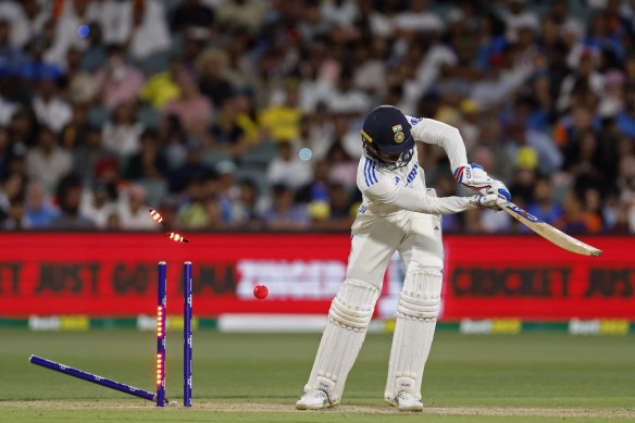 India’s Shubman Gill is bowled by Mitchell Starc in Adelaide.