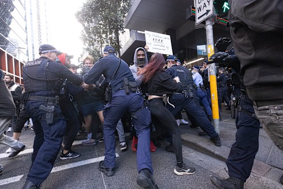 Protesters clash with police in Sydney last Saturday. 