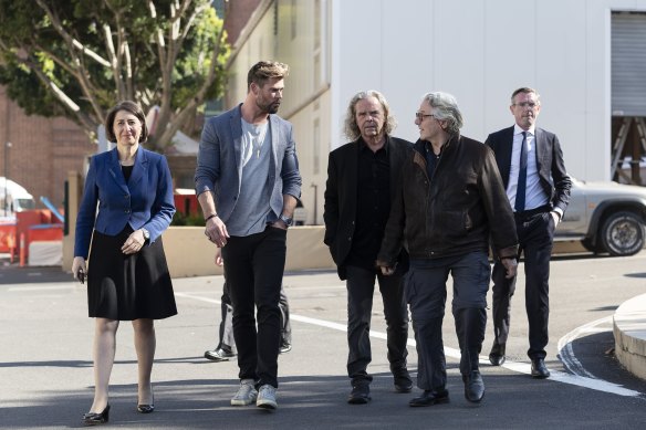 Premier Gladys Berejiklian, Treasurer Dominic Perrottet, Federal Communications Minister Paul Fletcher and Minister for the Arts Don Harwin, along with George Miller, Chris Hemsworth and Doug Mitchell announce the major new blockbuster Furiosa at Moore Park.