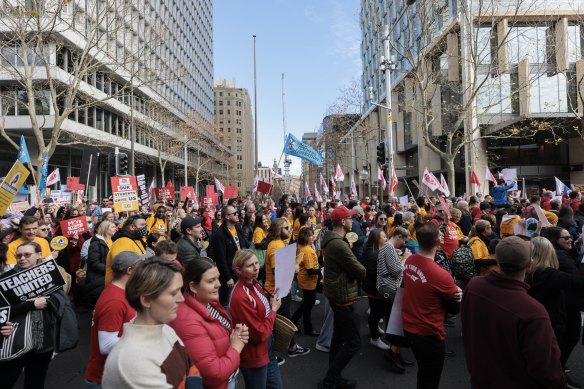 Teachers march to state parliament on Thursday in Sydney.