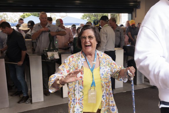 Penny Morris bursts through the gates of the SCG on the opening day of the Test.
