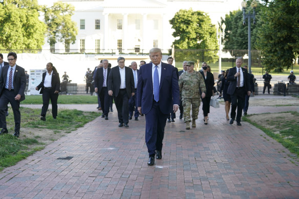 Trump walks to St John's Episcopal Church from the White House.