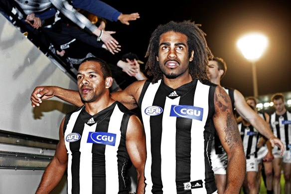 Leon Davis (left) with then-teammate Heritier Lumumba in 2011.