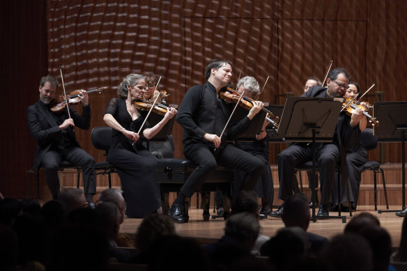 Joshua Bell draws a soaring romantic sound from his 1713 “Huberman” Stradivarius violin.