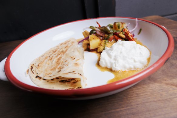 Nchanga roti and nkoko (roti with chicken).