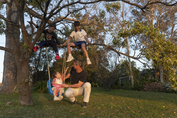 Mark Trowell at home with Oliver, 9; Charlie, 5; and Gracie, 2.
