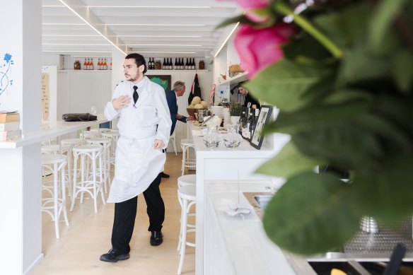 Sylvester Terzini running service at Snack Kitchen. 
