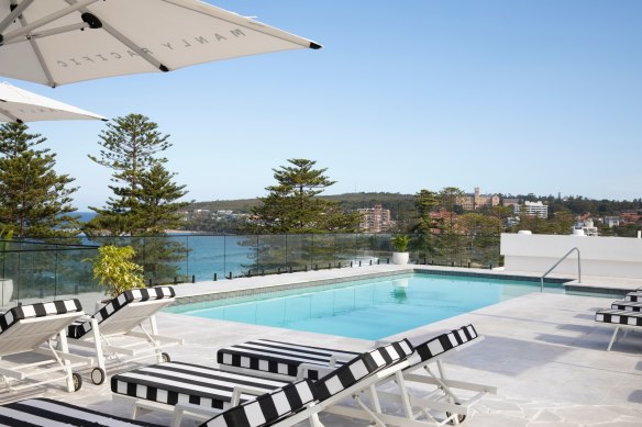 Rooftop pool and beach beyond.