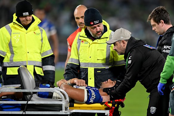Stephen Crichton is stretchered off after losing feeling in his arm following a tackle.