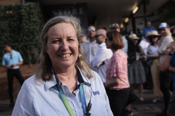 Gate A team leader Margo Carson controls the early morning rush at the Members Stand.