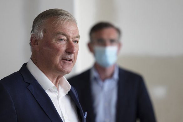 John Sharp fronts a press conference at Sydney Airport Terminal 2 earlier this year.