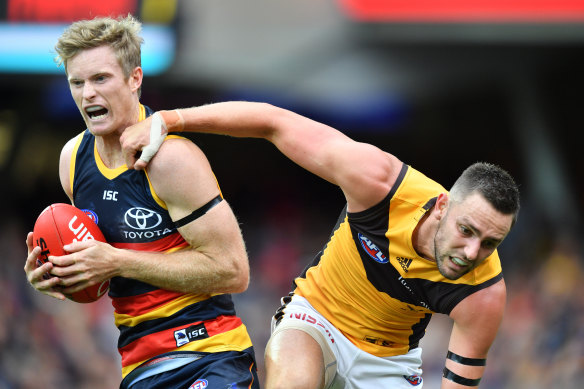 Alex Keath (left) in action for the Crows.
