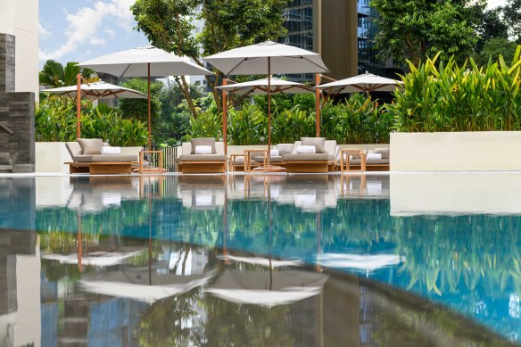 The Conrad’s pool feels ’70s cool. 