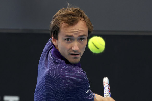 Russia’s Daniil Medvedev makes a backhand return against Russia’s Karen Khachanov in their quarter-final in Adelaide.