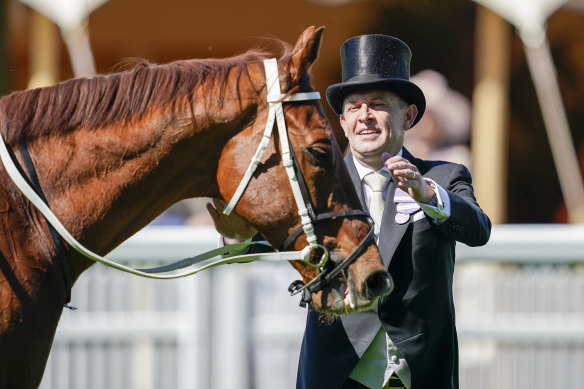 Trainer Chris Waller greets Nature Strip after his King’s Stand Stakes win at Royal Ascot.