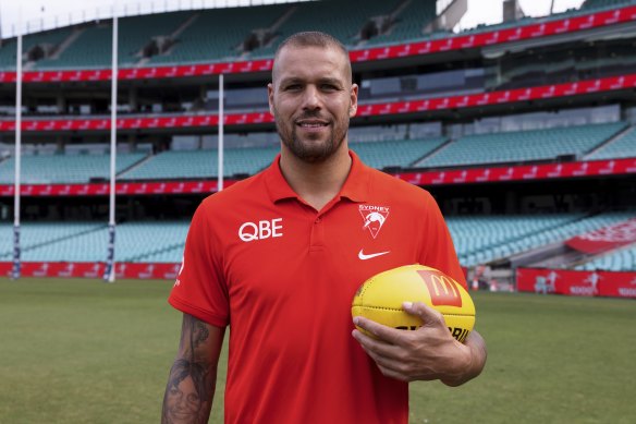 Lance Franklin with the ball he kicked, in almost the precise spot he kicked it, to bring up his 1000th career goal on Friday night at the SCG.