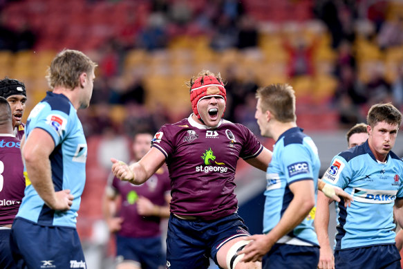 Harry Wilson celebrates scoring a try at Suncorp Stadium