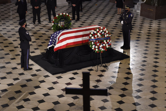 The casket of late Supreme Court Justice Ruth Bader Ginsburg lies in state at the US Capitol. 