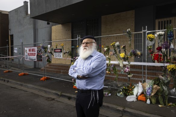 Rabbi Laibl Wolf at the Adass Israel synagogue, which was destroyed by fire in an alleged arson attack.
