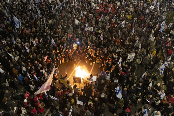 Protesters start a fire at a Tel Aviv protest calling for the release of all hostages, and against Israeli Prime Minister Benjamin Netanyahu’s government.