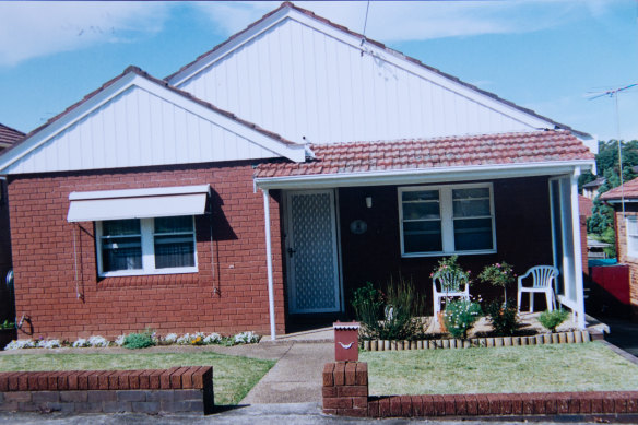 The original two-bedroom, brick veneer home, purchased in 1995.