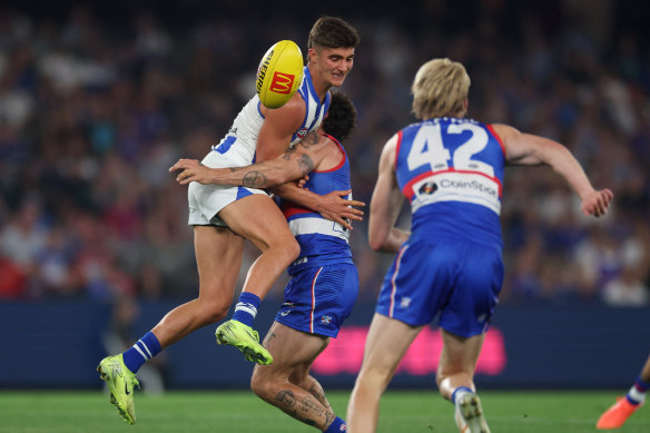 Harry Sheezel clashes heavily with acting Bulldogs skipper Tom Liberatore.