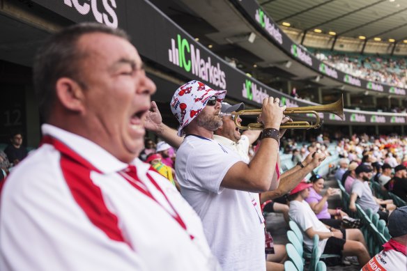Balmy Army member Steve Carroll sings during day four of the Ashes Test at the SCG.