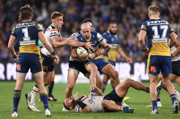Blake Ferguson of the Eels is tackled.