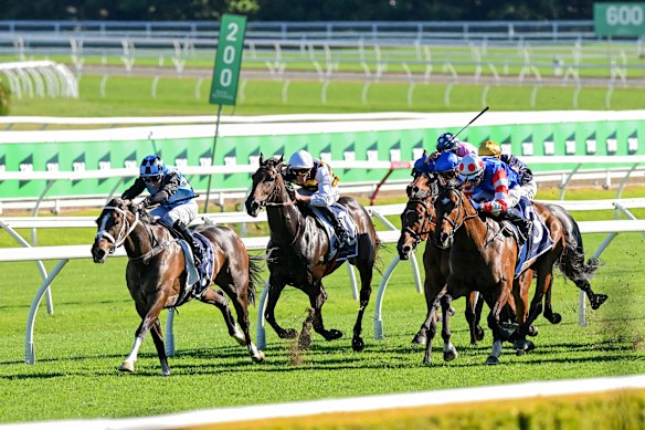 Lazzura pinches a gap late to win the Invitation.