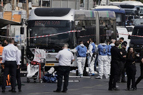Israeli police and rescue teams respond to the scene of the shooting in Jerusalem.