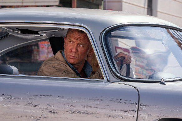 Daniel Craig driving on location in the southern Italian city of Matera.