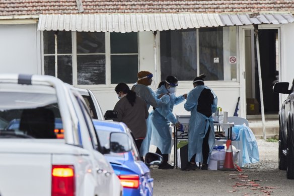 A drive-through COVID-19 testing location in Blacktown as cases spike in the region.