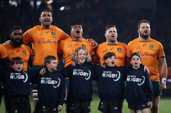 The Wallabies blast out the national anthem. 