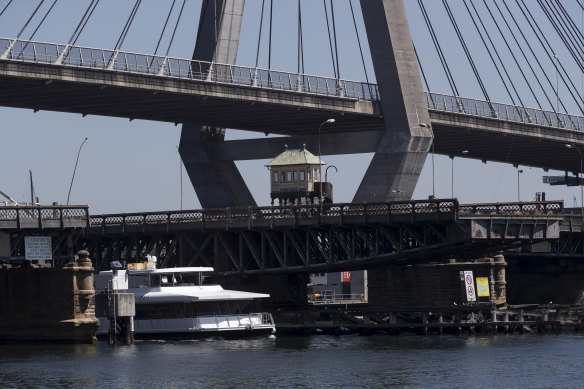The decaying Glebe Island Bridge is dwarfed by the nearby Anzac Bridge.
