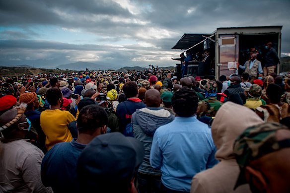 Former president Jacob Zuma addresses his supporters outside his home in Nkandla.