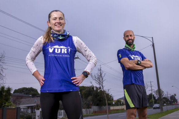 Ultra-upbeat: 'Rona Relay runners Cheryl Symons and Shane Winzar at the border of Murrumbeena and Bentleigh.