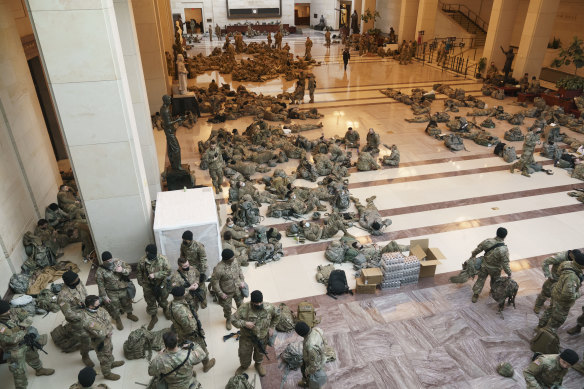 Hundreds of National Guard troops stationed inside the US Capitol ahead of the impeachment vote. 